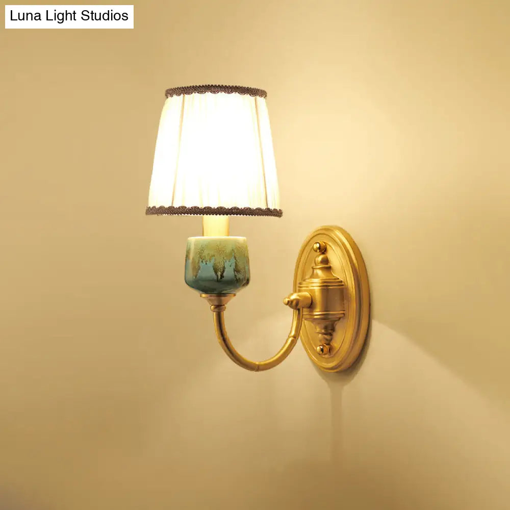 Brass Wall Hanging Light With Classic Swooping Arm And Fabric Shade