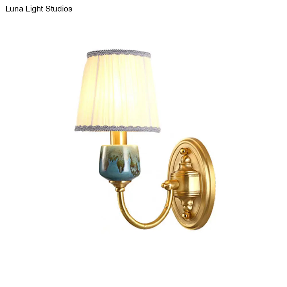 Brass Wall Hanging Light With Classic Swooping Arm And Fabric Shade