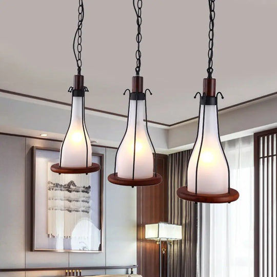 Brown Bottle Pendant Light With Cluster Design - Yellow/White Glass 3 Heads For Dining Room Ceiling