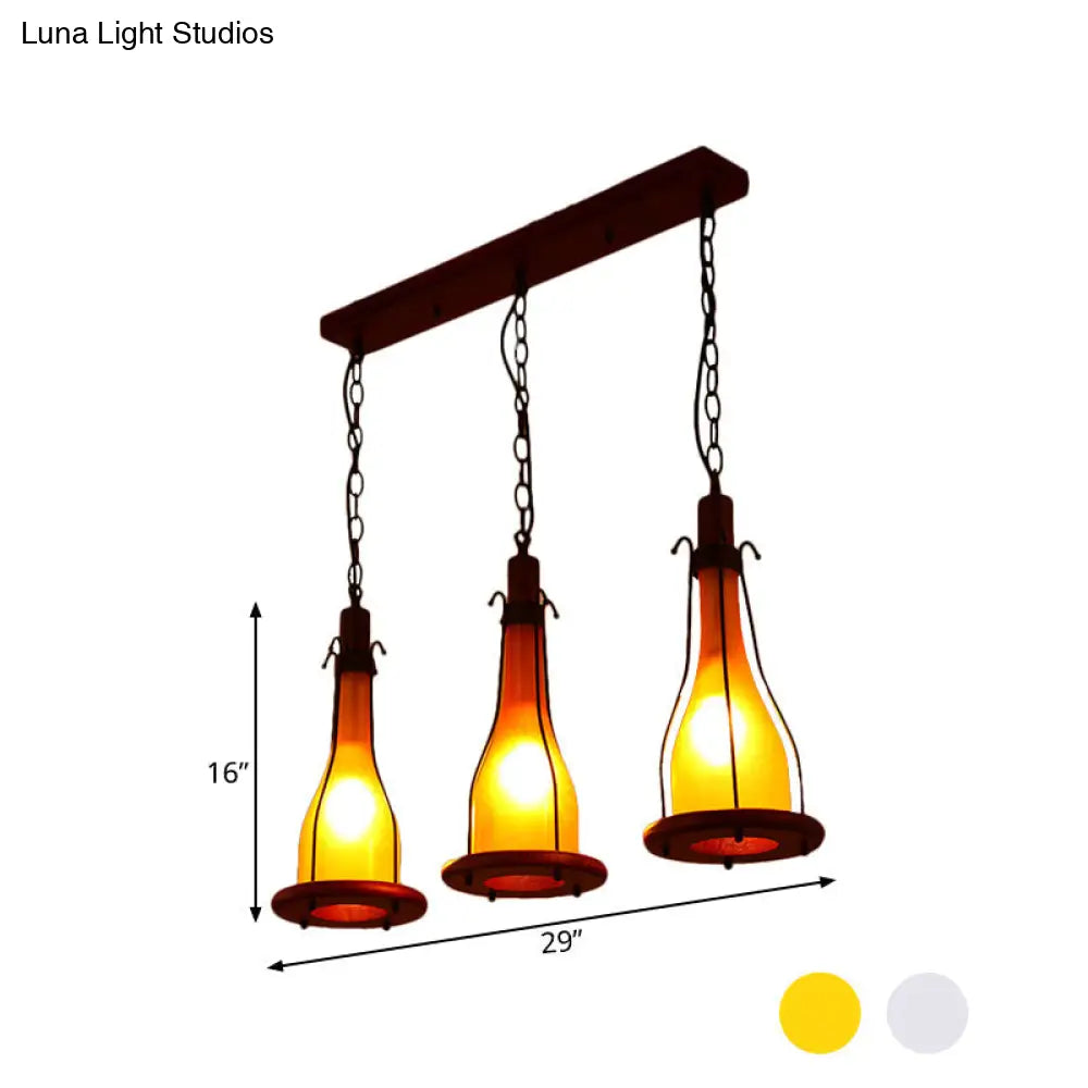 Industrial Chic 3-Light Cluster Pendant With Brown Bottles And Yellow/White Glass For Dining Room