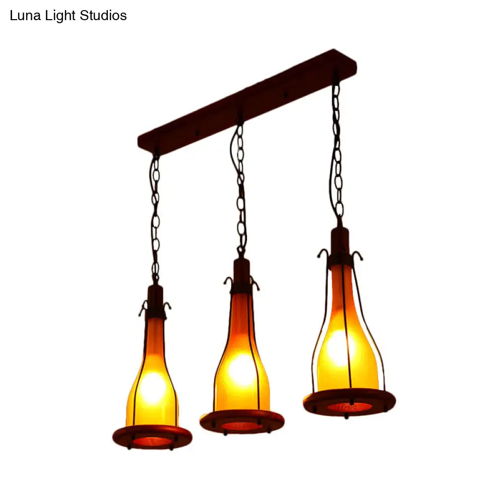 Brown Bottle Pendant Light With Cluster Design - Yellow/White Glass 3 Heads For Dining Room Ceiling