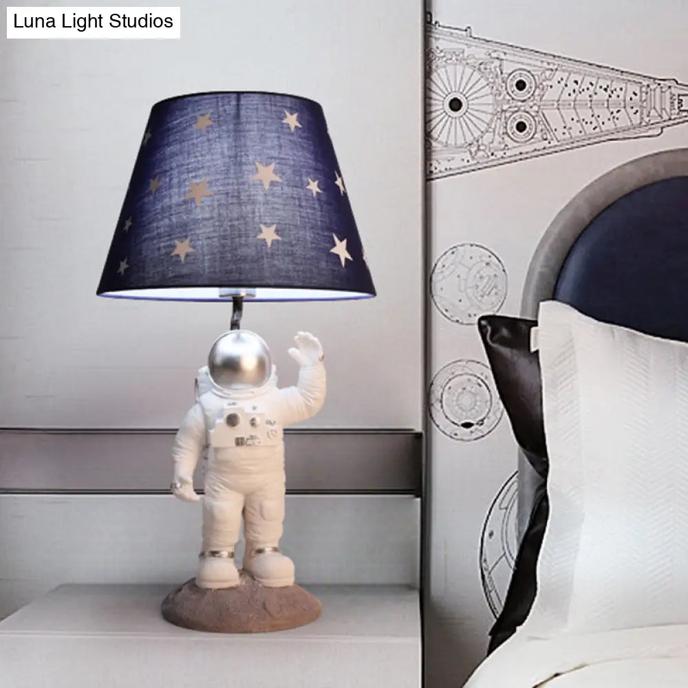 Cartoon Astronaut Table Lamp With Star Patterned Fabric Shade - Perfect Nightstand Lighting For Kids