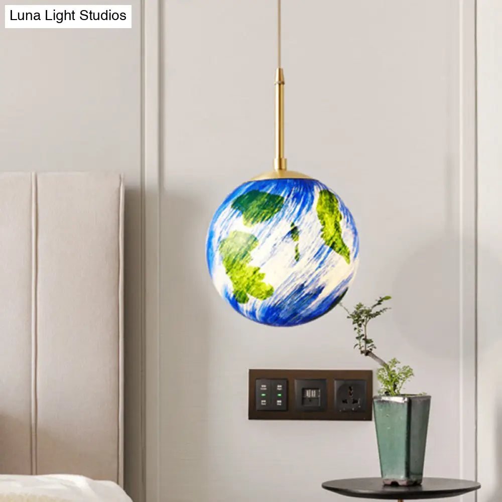 Cartoon Brass Pendulum Lamp With Blue Glass Shade - 1 Light Bedside Suspension 6/10 Wide