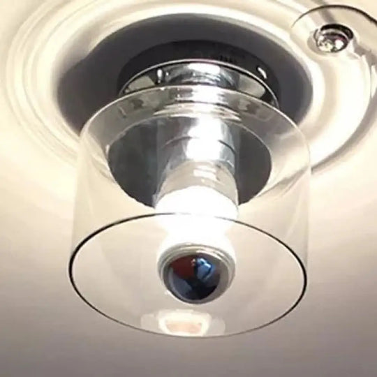 Chrome Cylinder Flush Mount With Clear Glass Shade For A Modern Look