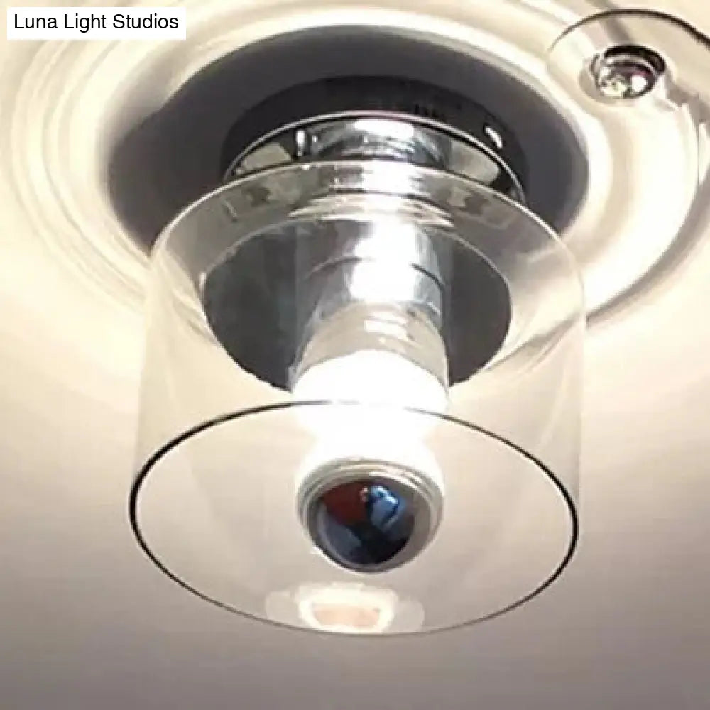 Chrome Cylinder Flush Mount With Clear Glass Shade For A Modern Look