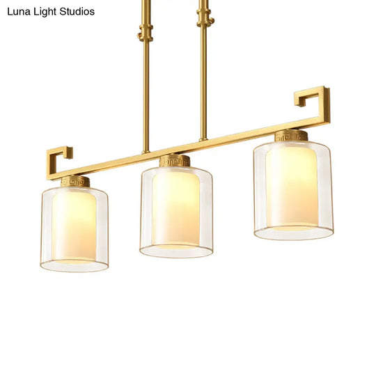 Classic 2-Layer Cylinder Island Lighting: Clear And Opal Glass Pendulum Lamp 3 Heads Brass Finish