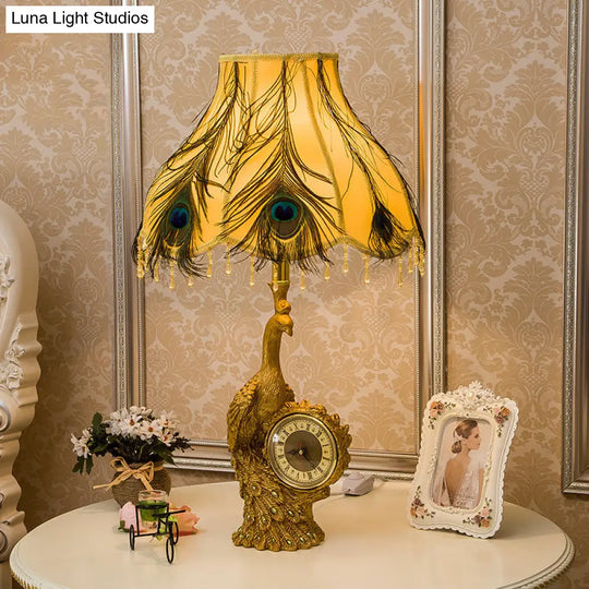 Classic Scalloped Table Light In Brown/Gold For Bedroom With Peacock And Clock Design - 1 Fabric