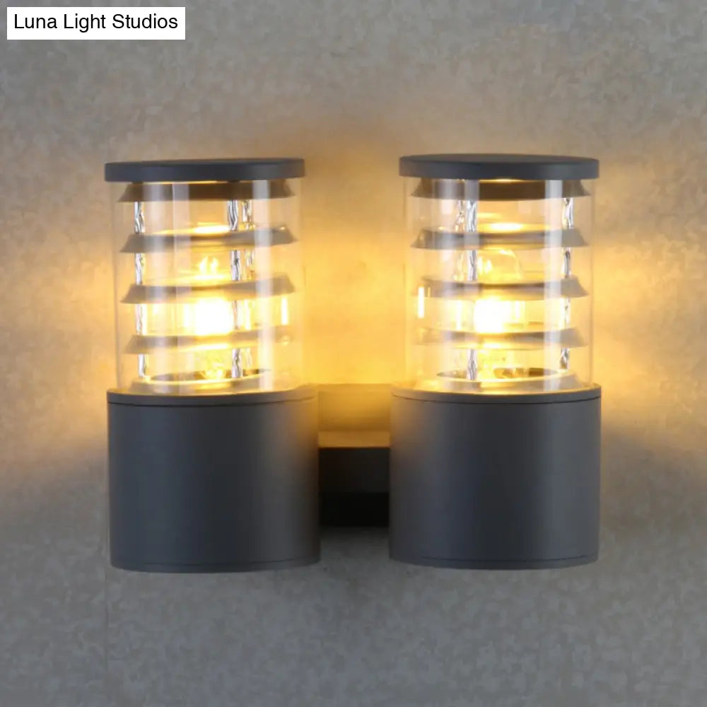 Clear Glass Cylinder Wall Sconce - 2-Light Outdoor Lamp In Grey With Inner Multi Circle Design