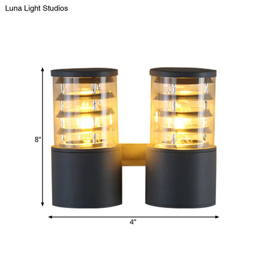 Clear Glass Cylinder Wall Sconce - 2-Light Outdoor Lamp In Grey With Inner Multi Circle Design