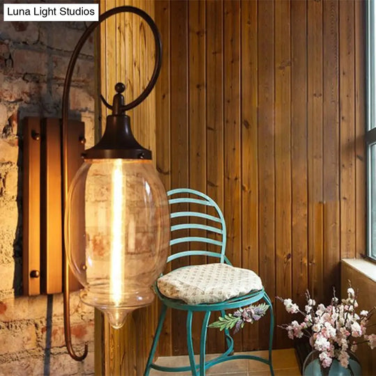 Clear Glass Sconce Light With Black Oval Shade - Industrial Wall Lamp For Living Room