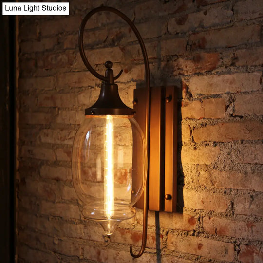 Clear Glass Sconce Light With Black Oval Shade - Industrial Wall Lamp For Living Room