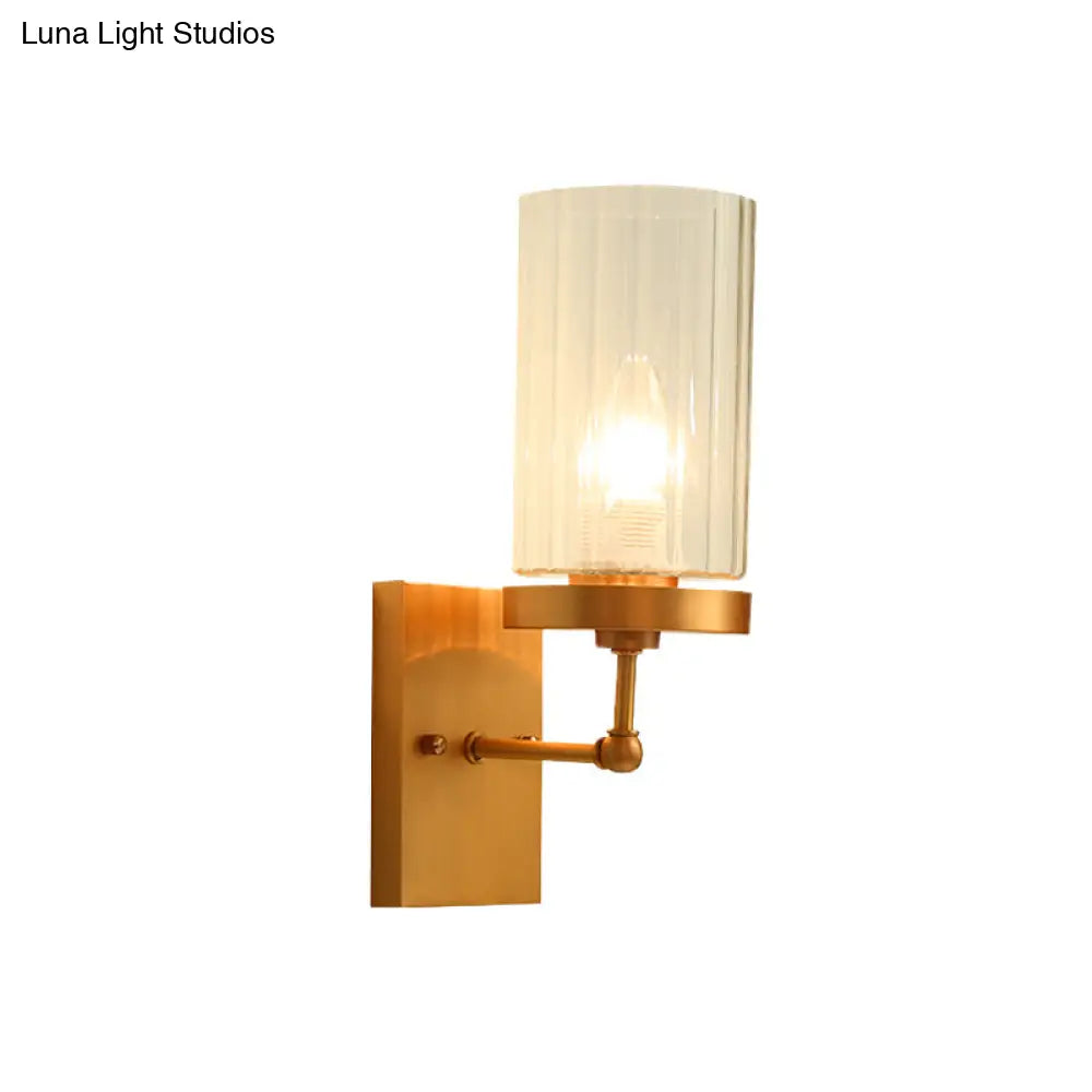 Clear Ribbed Glass Cylinder Wall Sconce In Gold - Bedroom Lighting Fixture