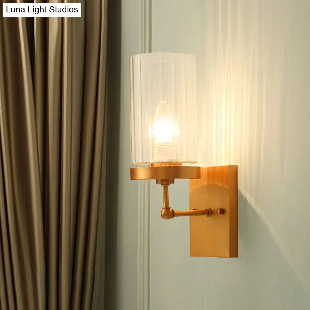 Clear Ribbed Glass Cylinder Wall Sconce In Gold - Bedroom Lighting Fixture