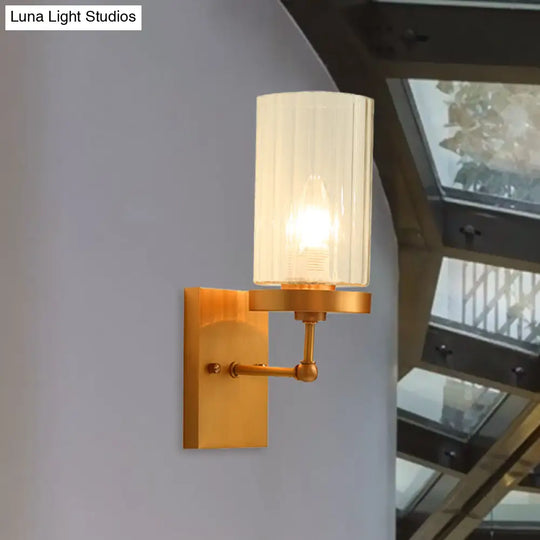 Clear Ribbed Glass Cylinder Wall Sconce In Gold - Bedroom Lighting Fixture