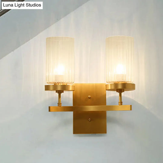 Clear Ribbed Glass Cylinder Wall Sconce In Gold - Bedroom Lighting Fixture