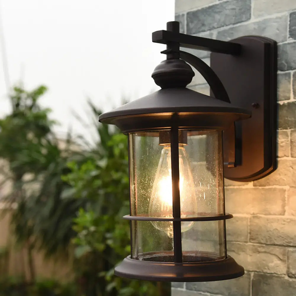 Clear Seeded Glass Cylinder Sconce Outdoor Wall Mounted Lamp For Garden - 1-Bulb Black/Coffee Finish