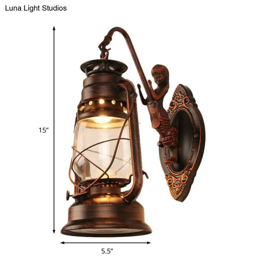 Coastal Bedroom Wall Light With Lantern Shade - Clear Glass Sconce In Black/Antique Brass/Weathered