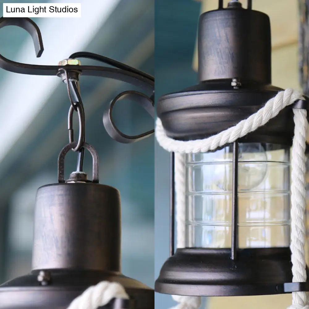 Coastal Black Kerosene Sconce With Clear Glass Bulb And Wooden Backplate For Outdoor Lighting