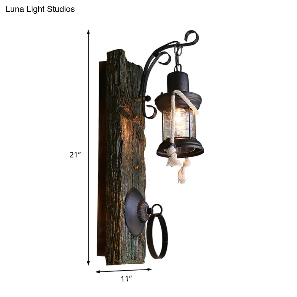 Coastal Black Kerosene Sconce With Clear Glass Bulb And Wooden Backplate For Outdoor Lighting