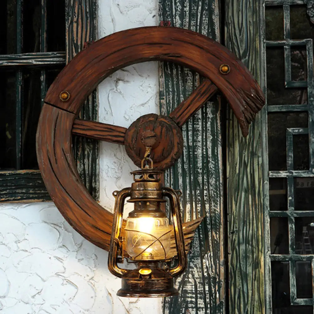 Coastal Kerosene Sconce: Clear Glass 1-Light Wall Mount Fixture In Brass With Wood Backplate