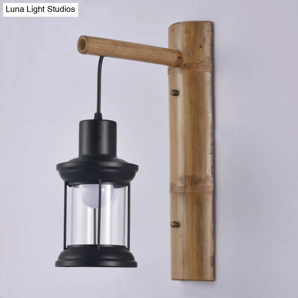 Coastal Lantern 1-Head Wall Light Sconce With Clear Glass And Bamboo Backplate