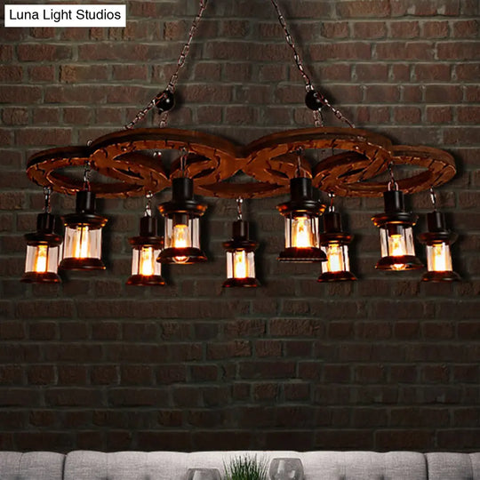 Coastal Lantern Chandelier: Clear Glass Lighting Pendant With Black Finish And Wooden Shelf