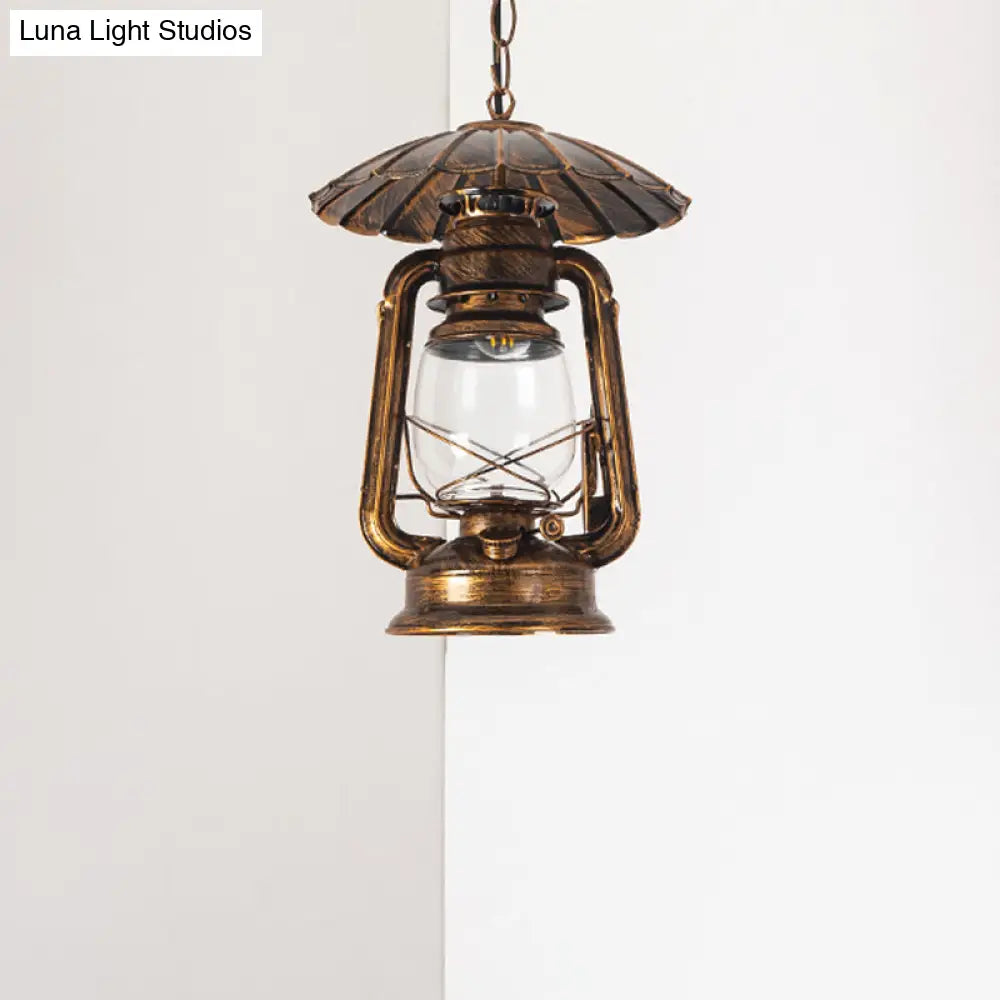 Coastal Restaurant 1-Head Metal Pendant Lamp With Clear Kerosene Glass Shade In Brass/Copper