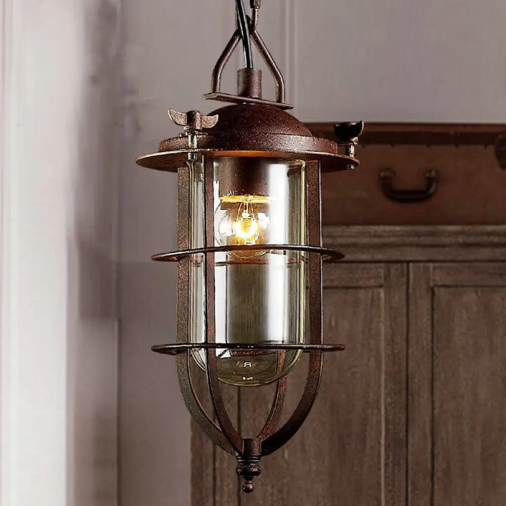 Coastal Rust Caged Lantern Pendant Fixture With Clear Glass - Single-Bulb Ceiling Light For Living