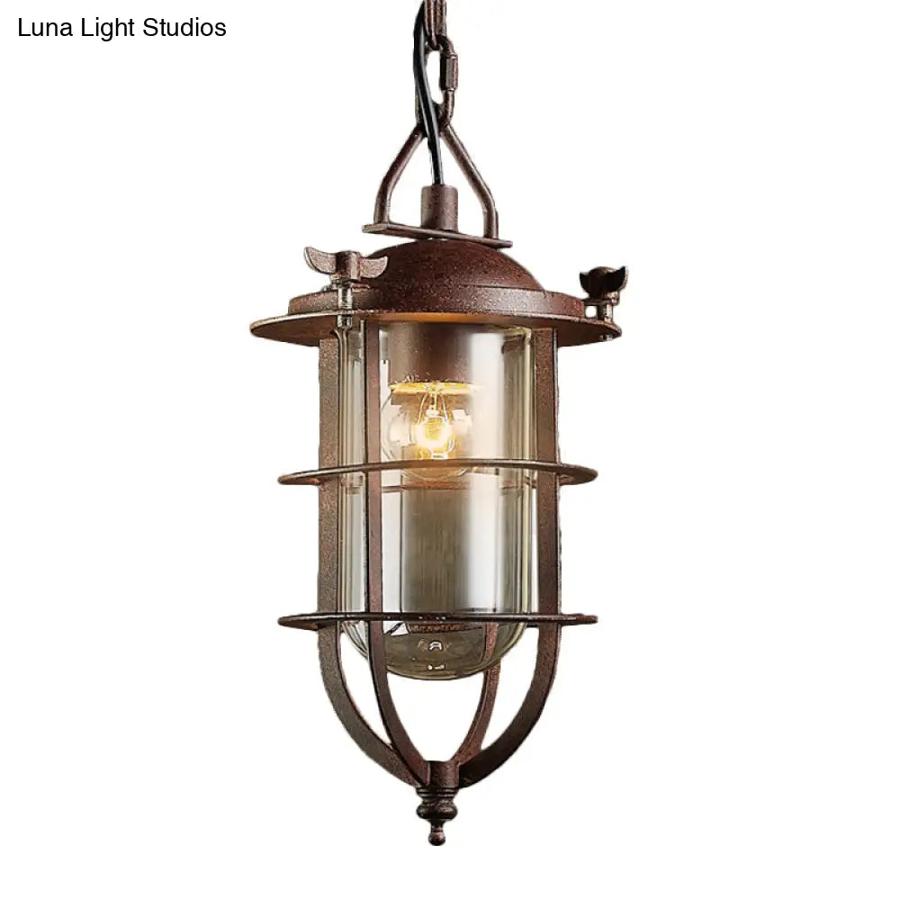 Coastal Rust Caged Lantern Pendant Fixture With Clear Glass - Single-Bulb Ceiling Light For Living