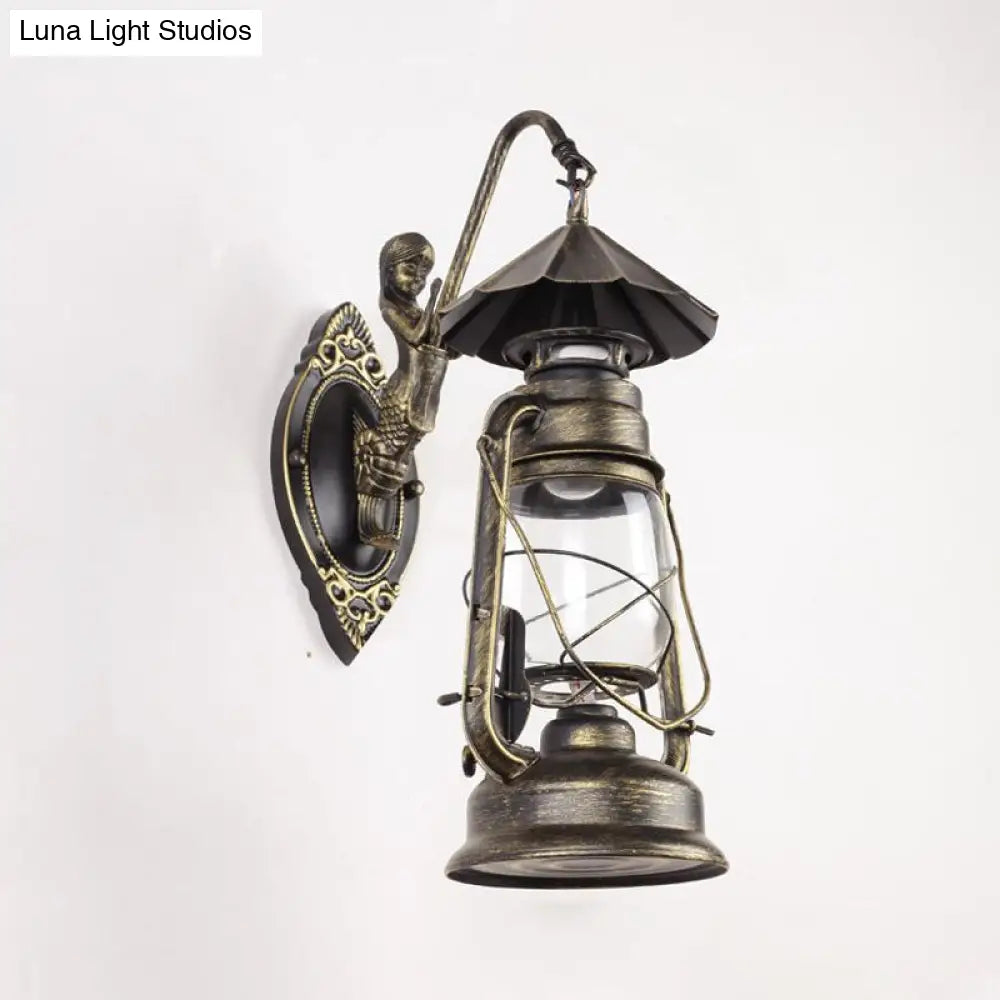 Coastal Single Bulb Kerosene Glass Wall Sconce In Black/Antique Brass For Living Room