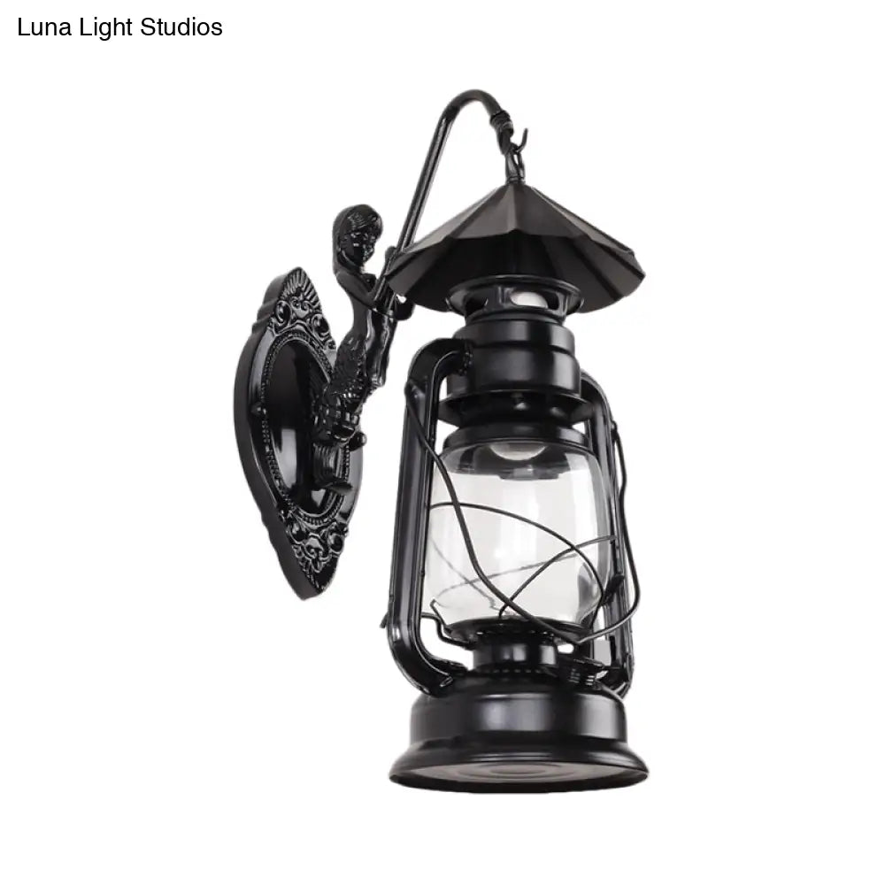 Coastal Single Bulb Kerosene Glass Wall Sconce In Black/Antique Brass For Living Room