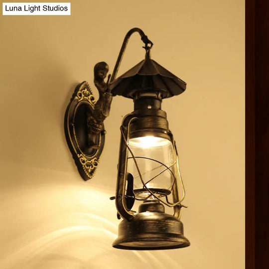 Coastal Single Bulb Kerosene Glass Wall Sconce In Black/Antique Brass For Living Room