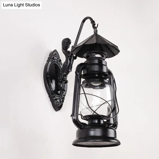 Coastal Single Bulb Kerosene Glass Wall Sconce In Black/Antique Brass For Living Room