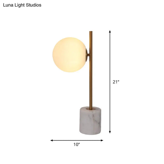 Simple White Glass Ball Night Lamp With Brass Pole And Marble Base