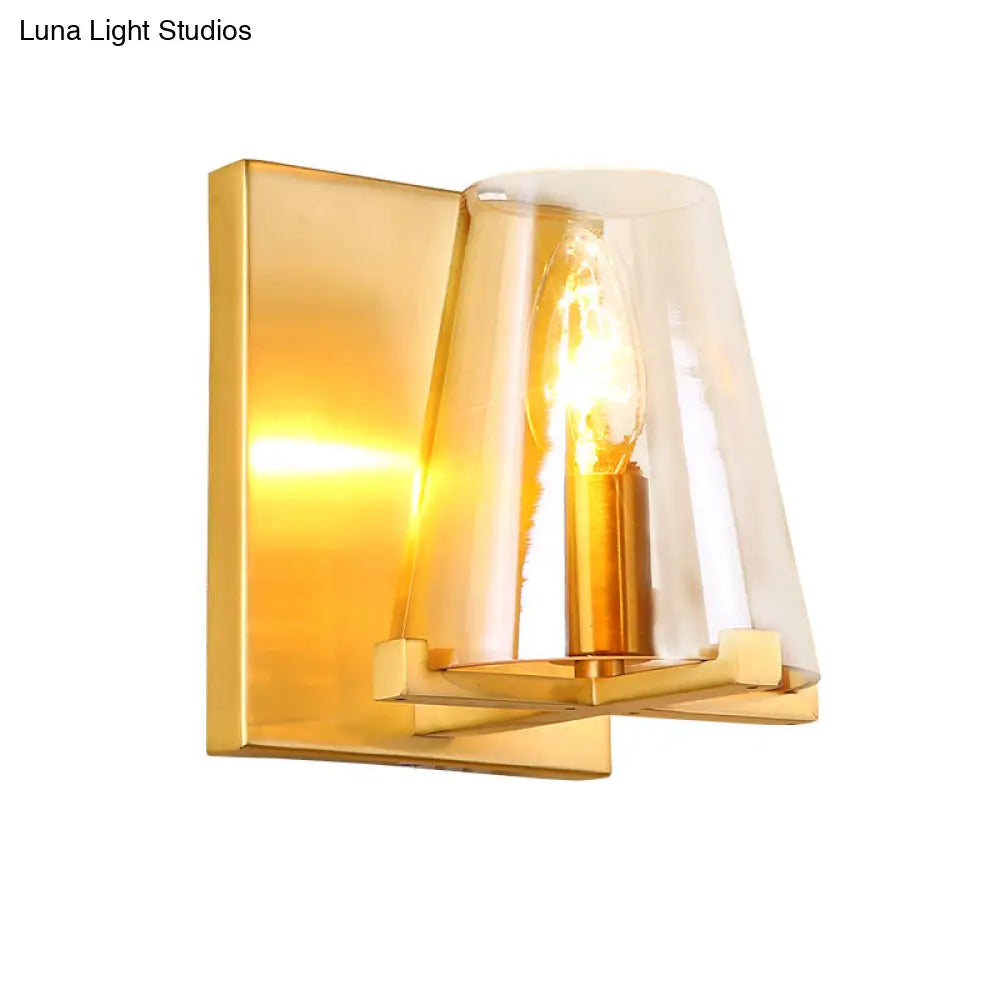 Colonial Wall Sconce: Clear Glass Cone-Shaped Light Fixture With Brass Mount For Kitchen