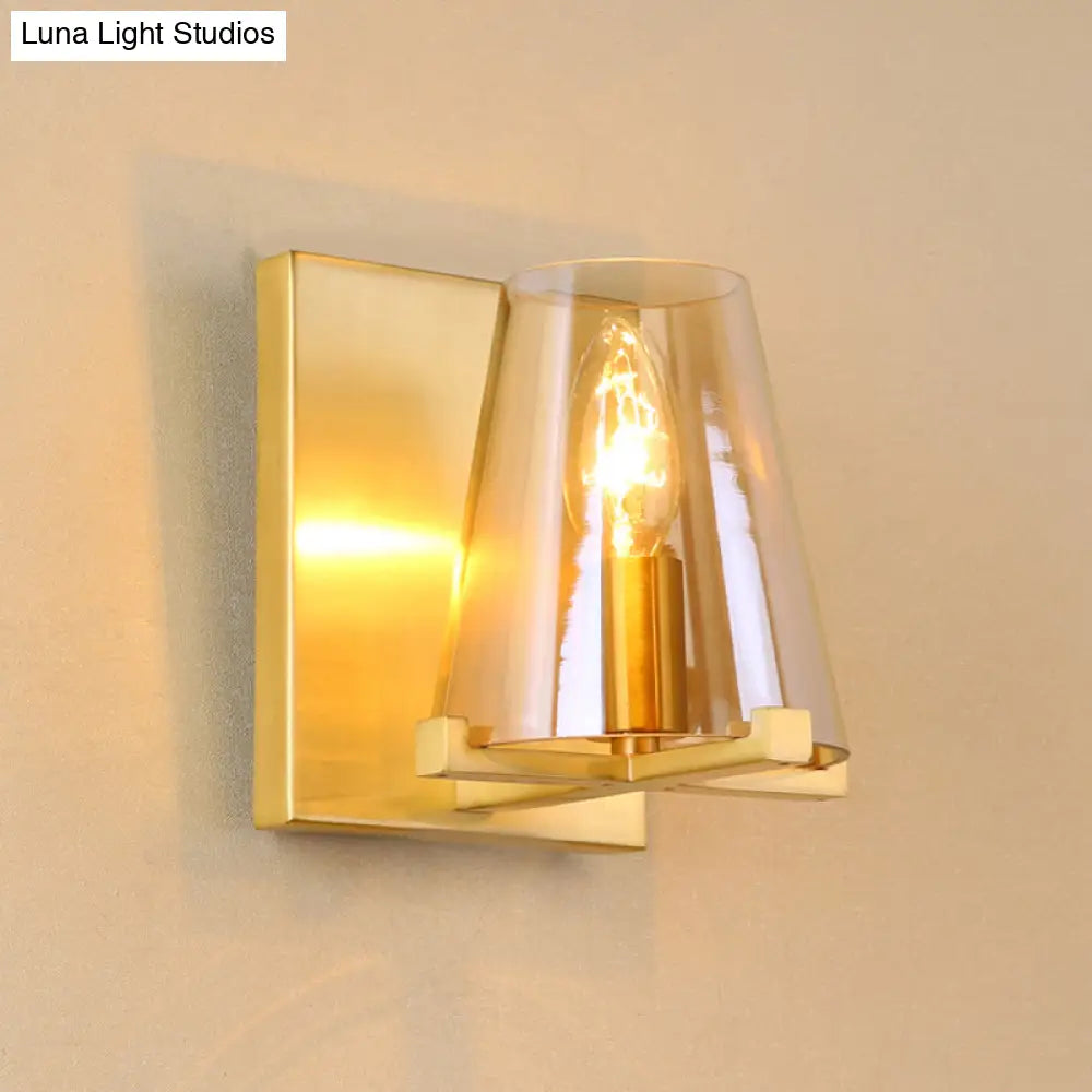 Colonial Wall Sconce: Clear Glass Cone-Shaped Light Fixture With Brass Mount For Kitchen