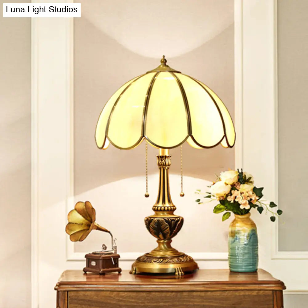 Colonialist Beige Glass 1-Bulb Nightstand Lamp - Gold Scalloped Metal Table Light With Pull Chain