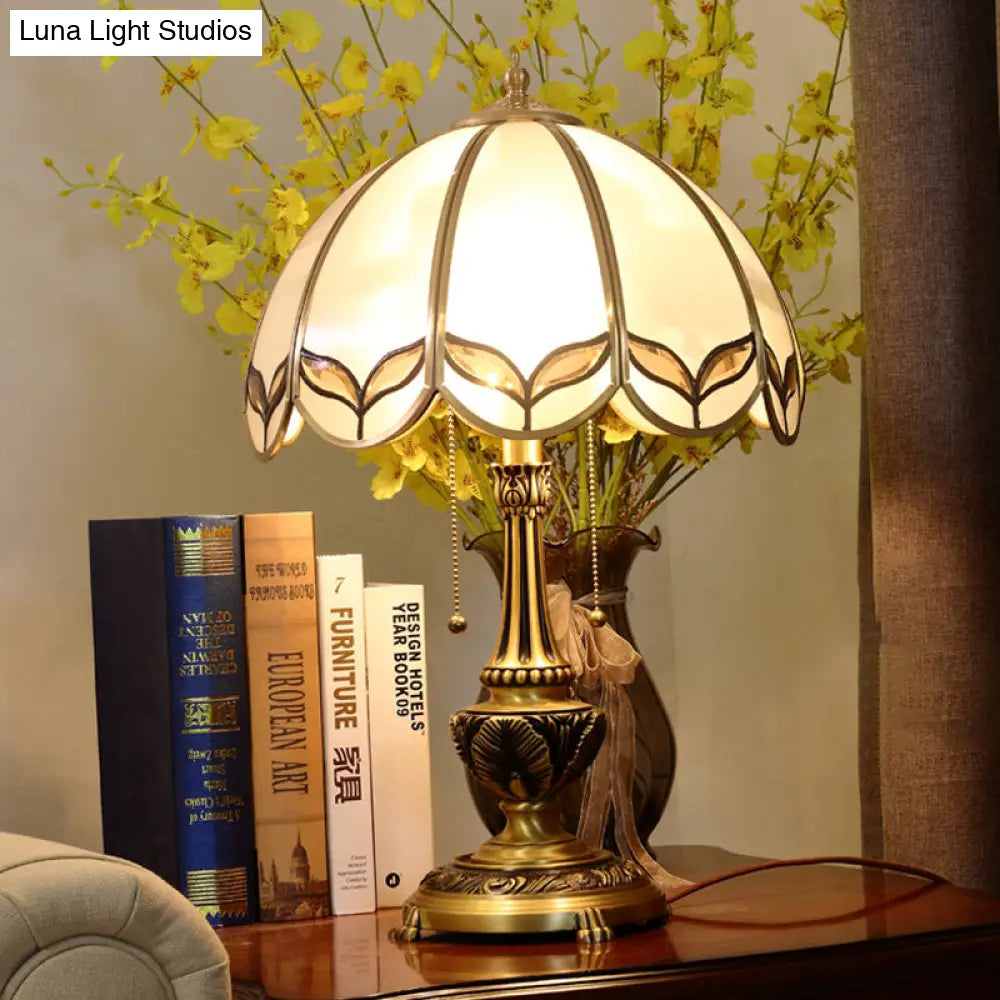 Colonialist Beige Glass 1-Bulb Nightstand Lamp - Gold Scalloped Metal Table Light With Pull Chain