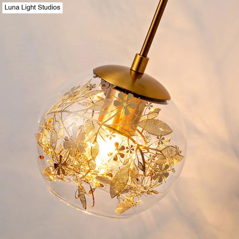 Contemporary 1-Light Clear Glass Bubble Wall Lamp With Foil Flower Decor