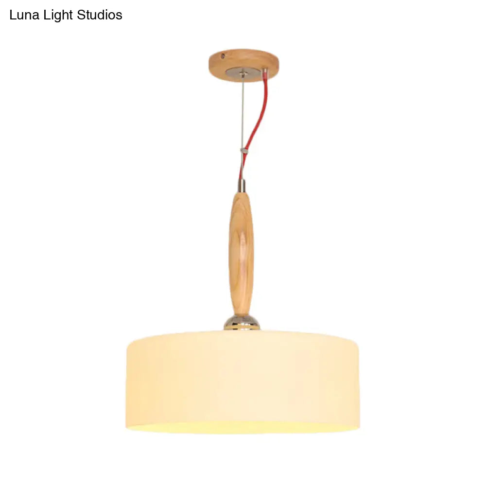 Contemporary Beige Restaurant Pendant With 1-Light Down Lighting And Drum White Glass Shade