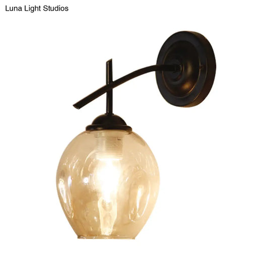 Contemporary Black/Gold Wall Sconce With Oval Amber/Gold/Clear Glass Shade - Elegant Half-Light