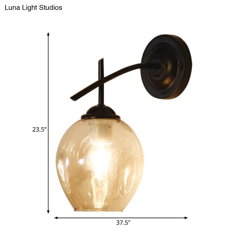 Contemporary Black/Gold Wall Sconce With Oval Amber/Gold/Clear Glass Shade - Elegant Half-Light