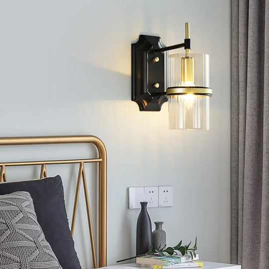 Contemporary Black Iron Wall Lamp With Clear Glass Shade - 1 Bulb Circular Sconce Lighting