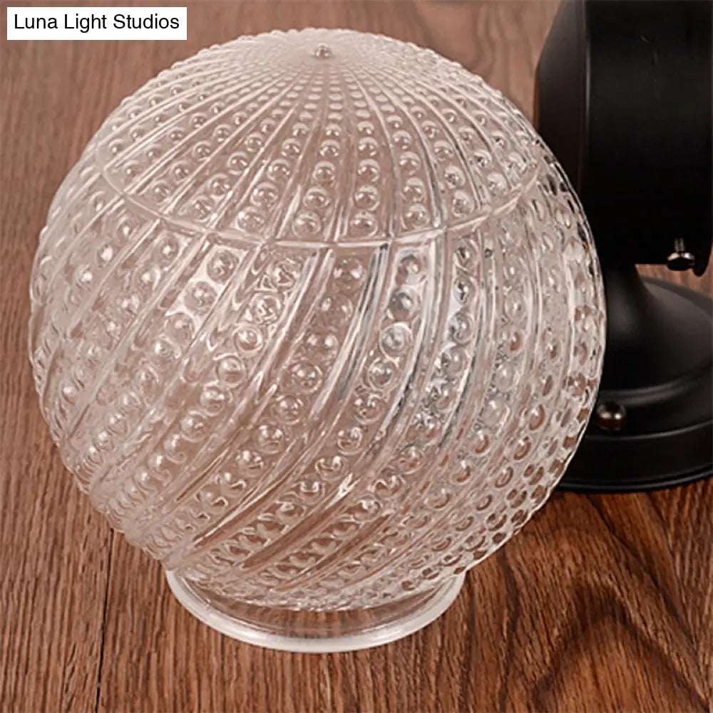 Contemporary Black/White Sconce Light With Globe Lattice Glass Shade - 1 Passage Wall Lighting