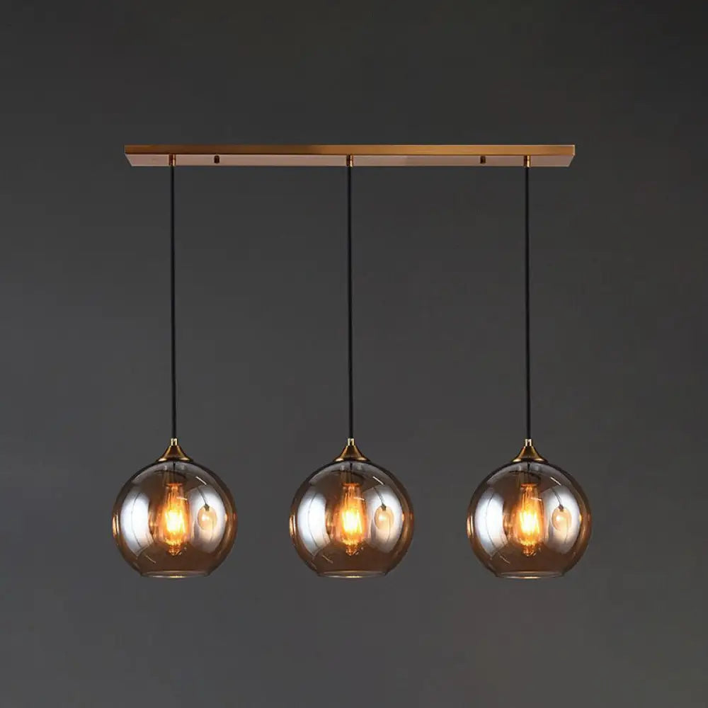 Contemporary Blown Glass Sphere Pendant Lights For Bedrooms Amber / Linear