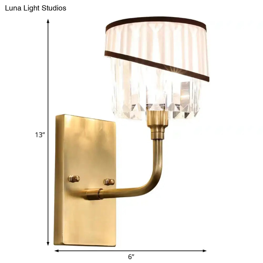 Contemporary Brass Cylinder Sconce With Crystal And Curved Arm Wall Mount Light