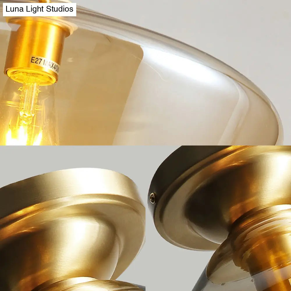 Contemporary Brass Flush Ceiling Fixture With Amber Glass Lampshade