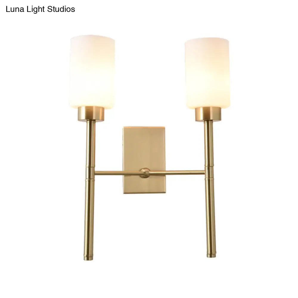 Contemporary Brass Sconce With White Glass Shade - Mounted Dual Bulb Wall Light