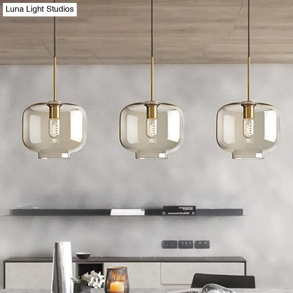 Contemporary Brass Pendant Light With Clear Glass Shade - Oval/Drum/Cylinder 1-Light 7/10/11 Wide