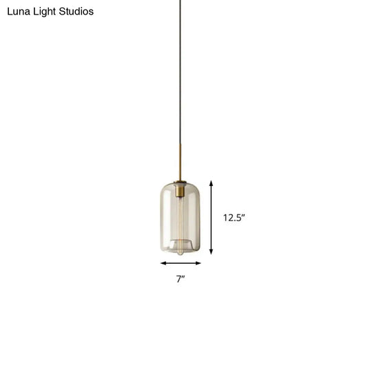 Contemporary Brass Pendant Light With Clear Glass Shade - Oval/Drum/Cylinder 1-Light 7/10/11 Wide